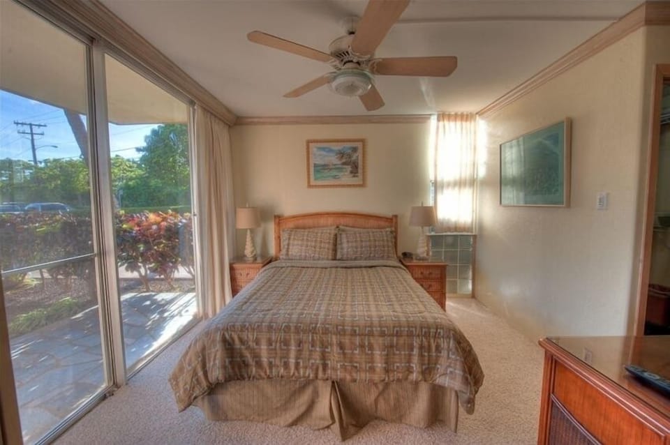 master bed has an ocean view with 32" flatscreen TV