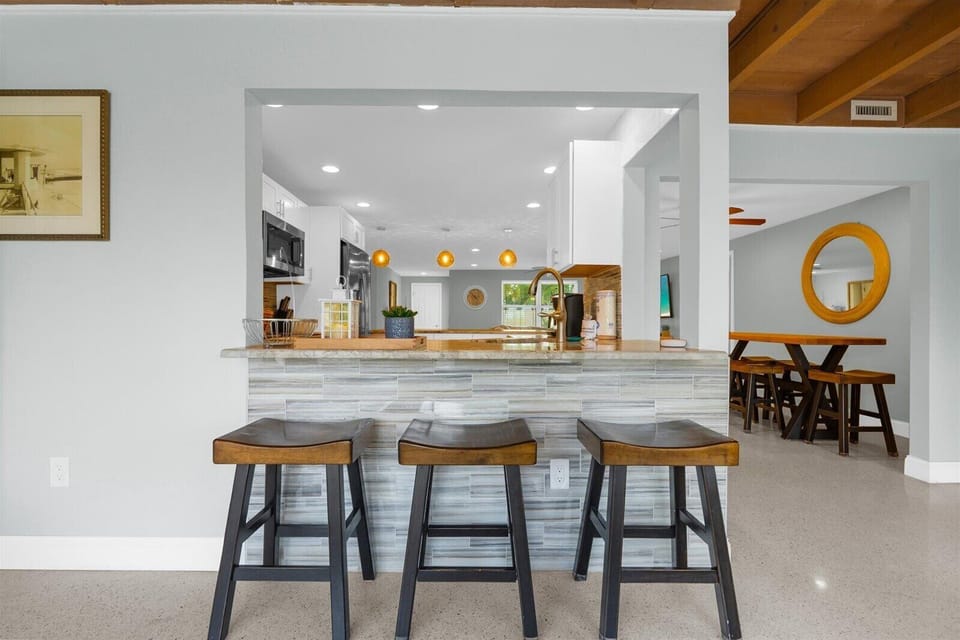 pool side of the kitchen counter seating