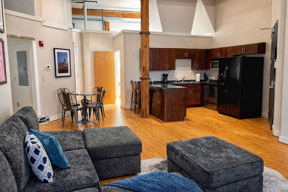 Spacious living room with kitchen combo.