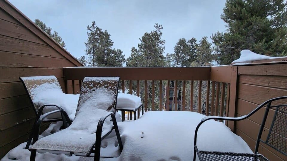 The home features two outdoor balcony/patio areas where you can enjoy the surrounding views and fresh mountain air.