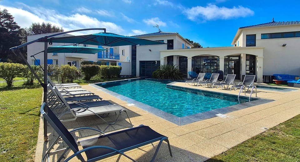 Take in gorgeous views while lounging around the on-site outdoor pool.
