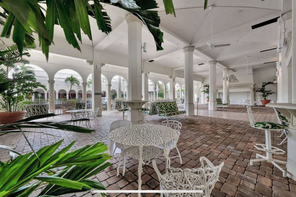 Palm Beach Hotel Outdoor Seating Area Next to the Pool