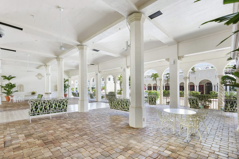 The Palm Beach Hotel Outdoor Seating Area (located directly next to the pool)