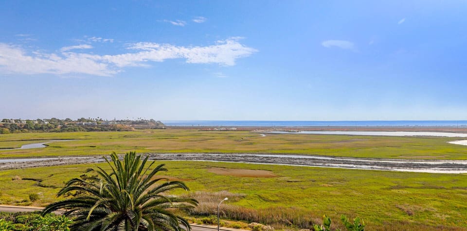 Ocean and lagoon view lookout point with telescope.