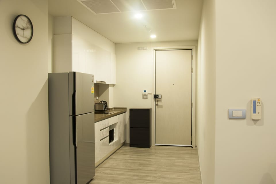 kitchen with toaster kettle plate pot glass