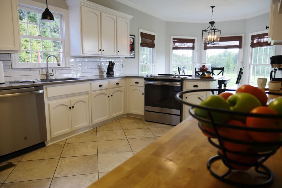Farmhouse Cabinets, with Butcher Block and new Quartz tops are ready for a chef!