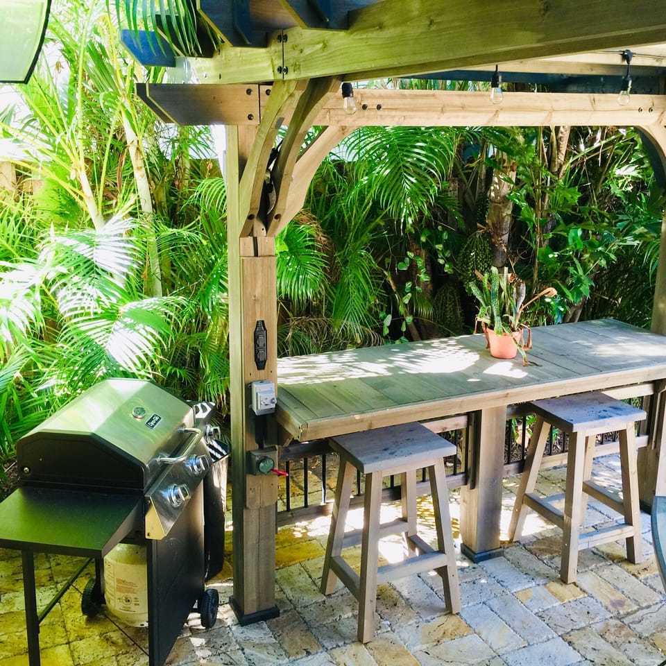 Perfect for an evening barbeque, the outdoor dining area has plenty of seating.