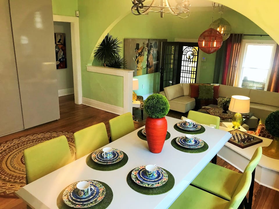 There is bar seating in the kitchen as well as a dining room table that seats 8.