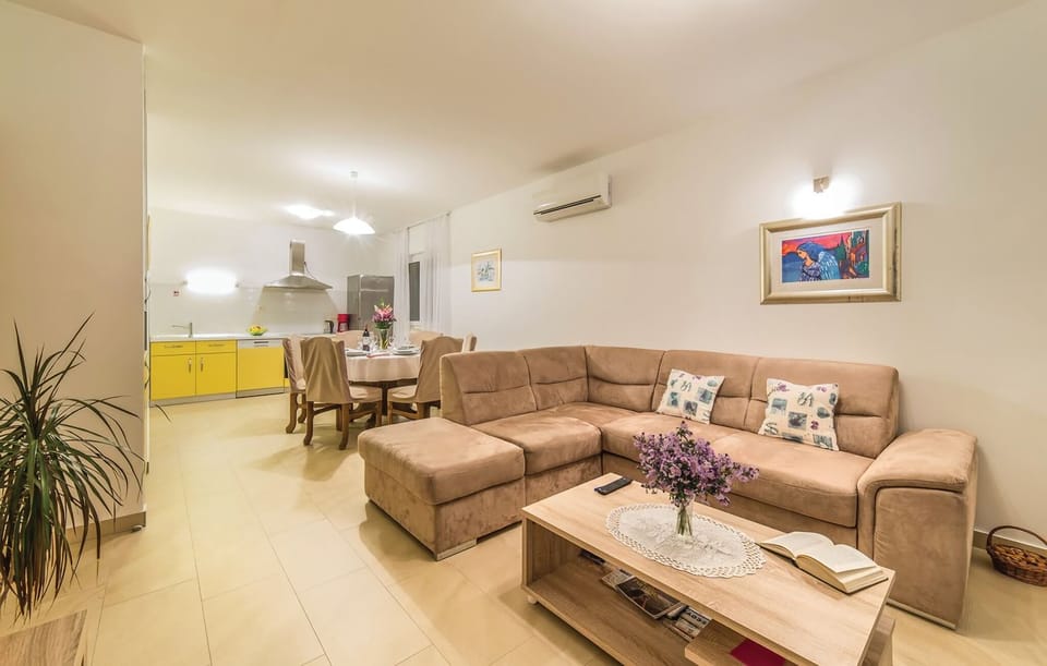 Living room with corner  set and SAT TV