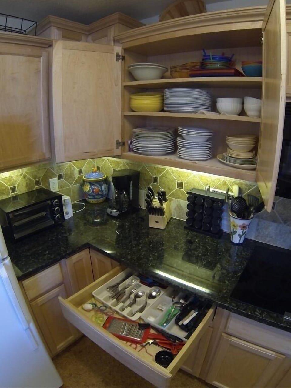 Well-stocked kitchen with everything you need from spices to cheese graters!