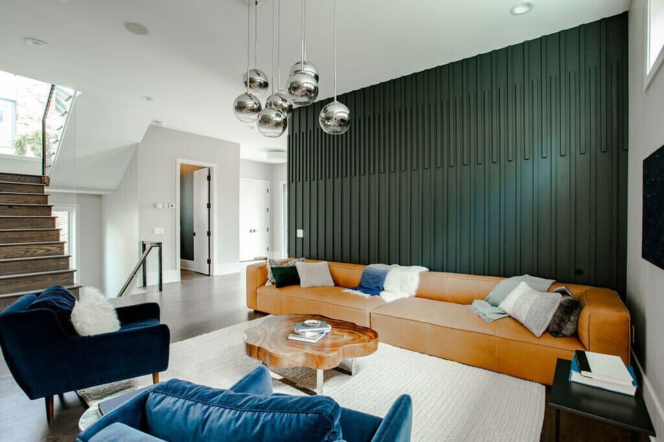 12 foot sofa in the main living room, adjacent to the dining room and kitchen 