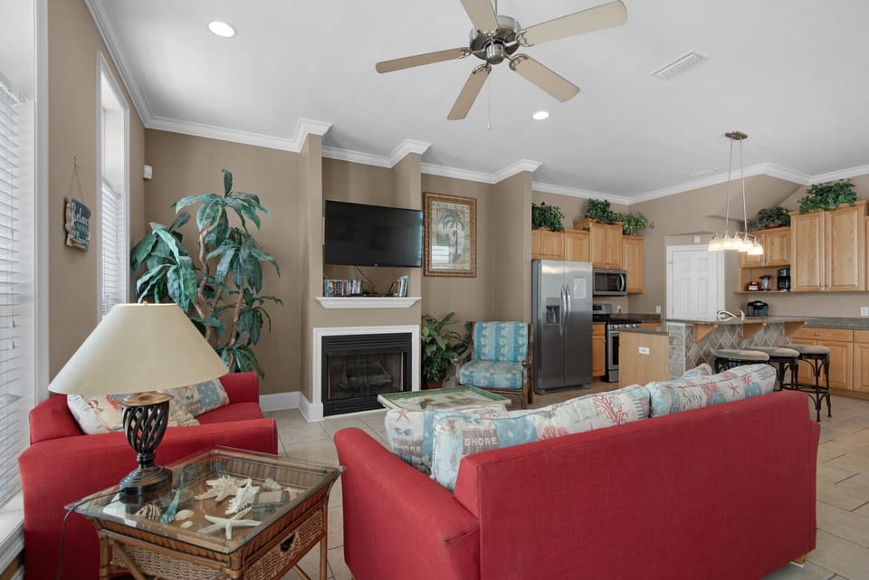 Den with TV and Fireplace. 
