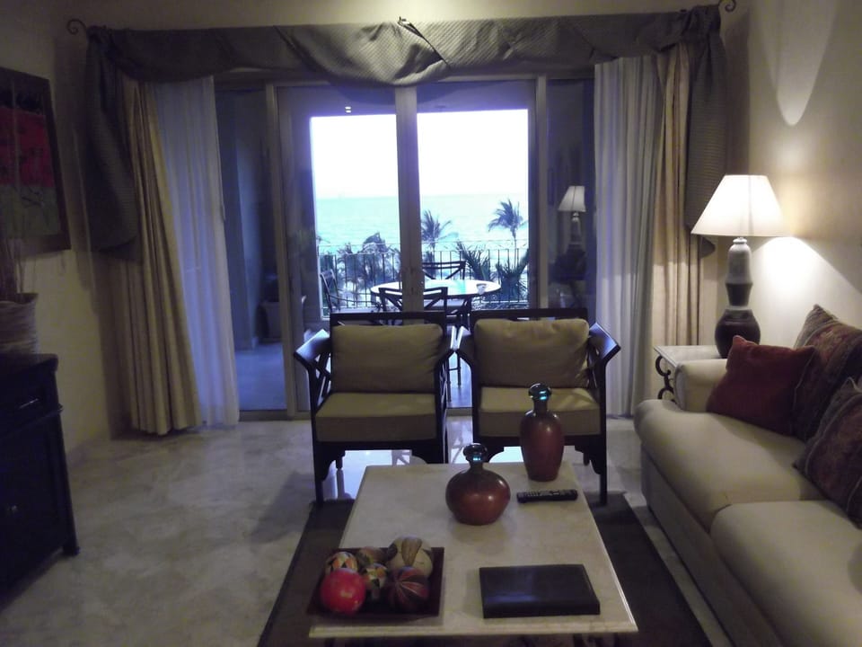 Living Room With Balcony Curtains Open - TONS of light and views.