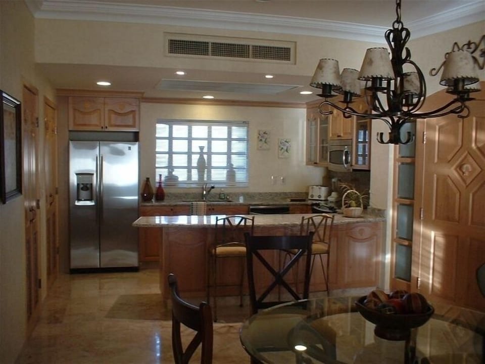 Dining area & Fully Equipped Kitchen including microwave, dishwasher, stove