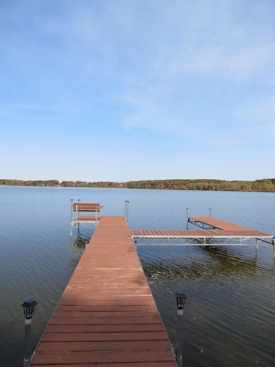The dock with a bench at the end for morning coffee.