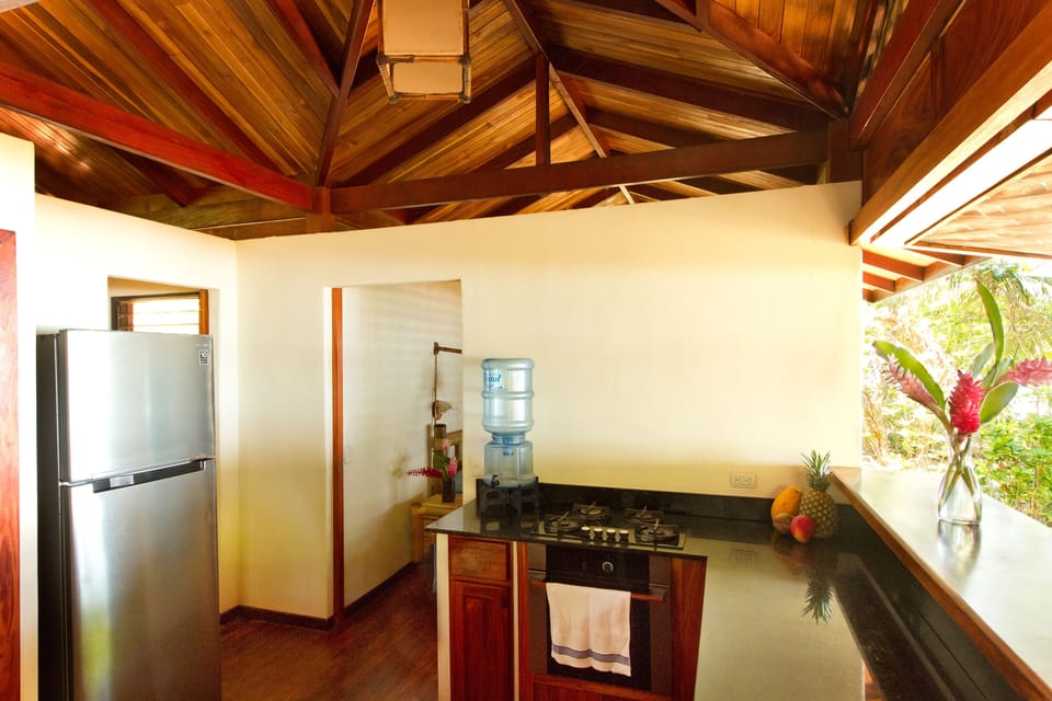 Main house kitchen, doorway leads to master bedroom
