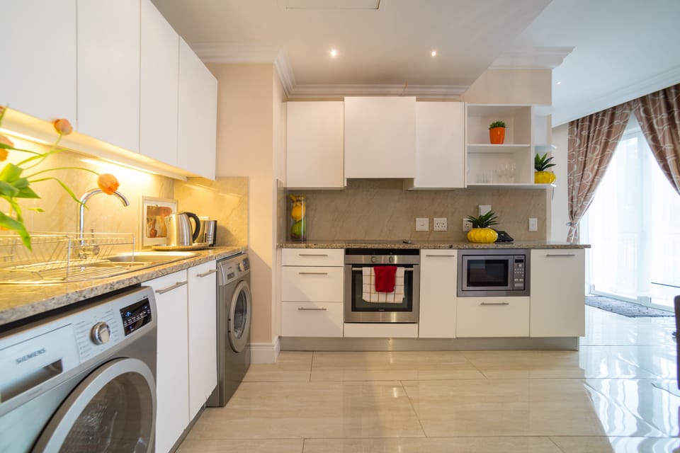 Fully fitted kitchen with washer and dryer