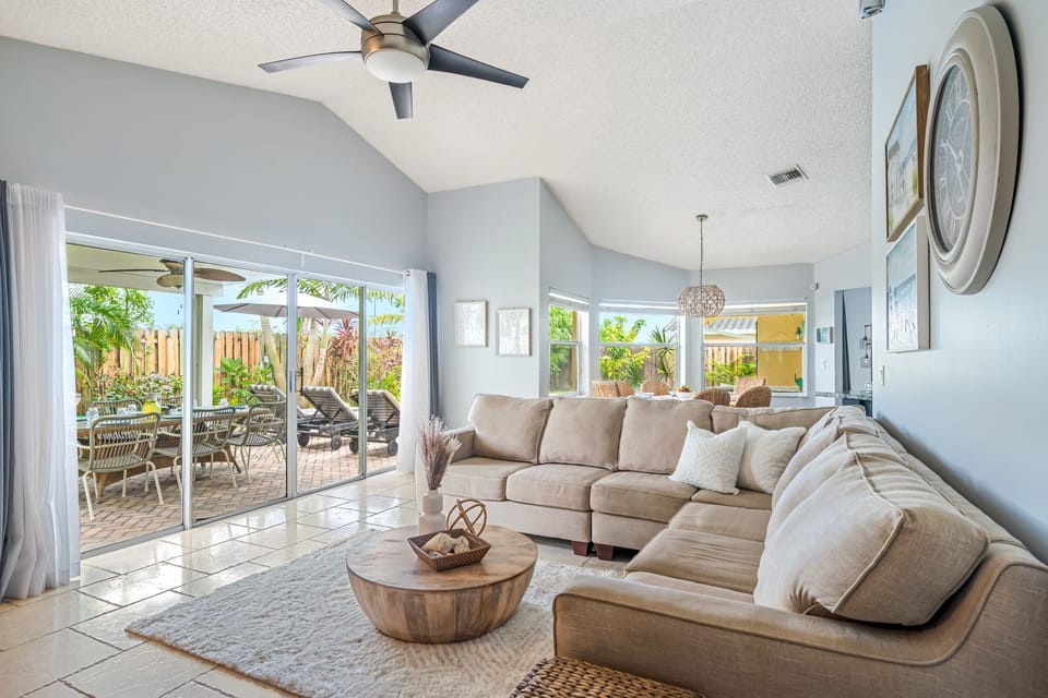 Family room with sectional couch and SmartTV, perfect for winding down.