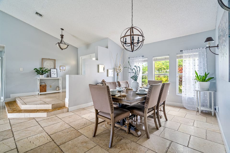 Vaulted, spacious Formal Dining Room with seating for 6.