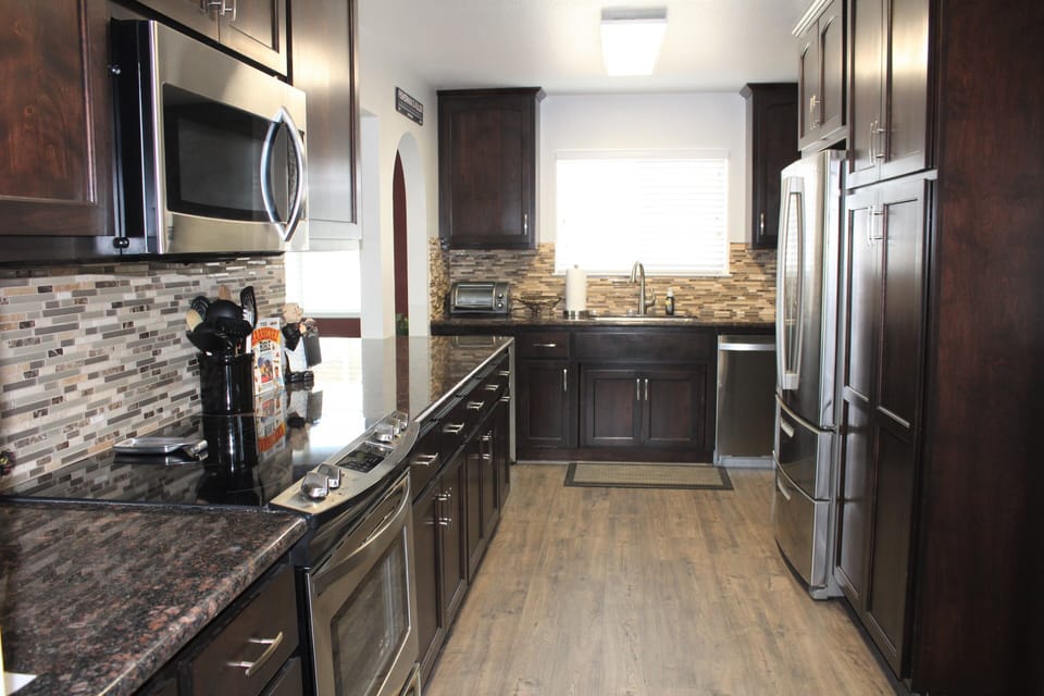 Kitchen has just about anything you could need for serving, eating, and cooking.