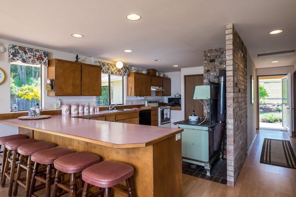 Our large kitchen, bar and my great grandmothers antique stove