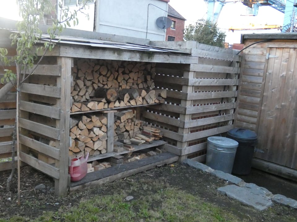 Log store in garden