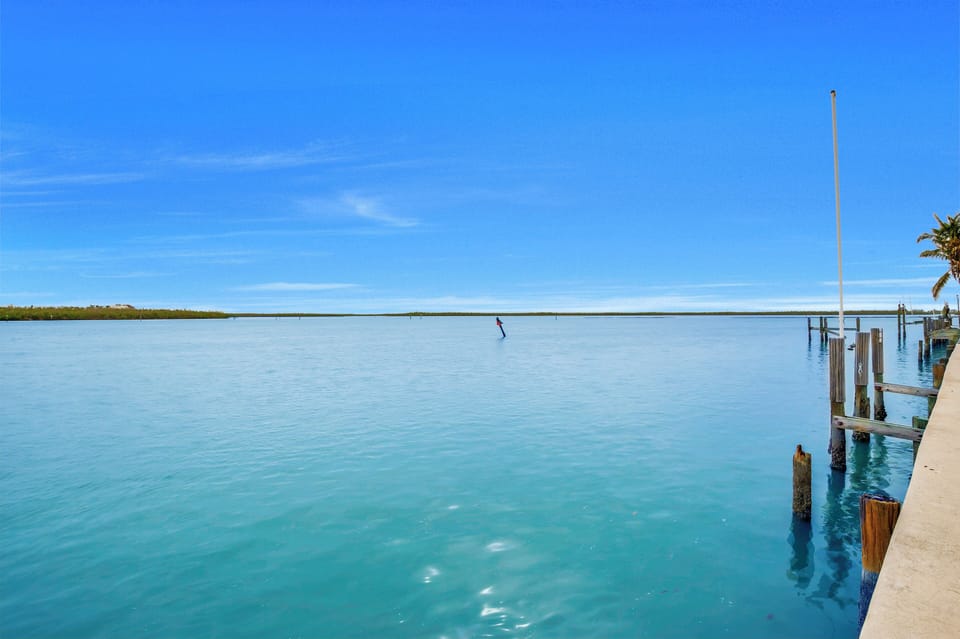 Beautiful open water view is now upgraded with a brand new boat dock available for use! See next photo.