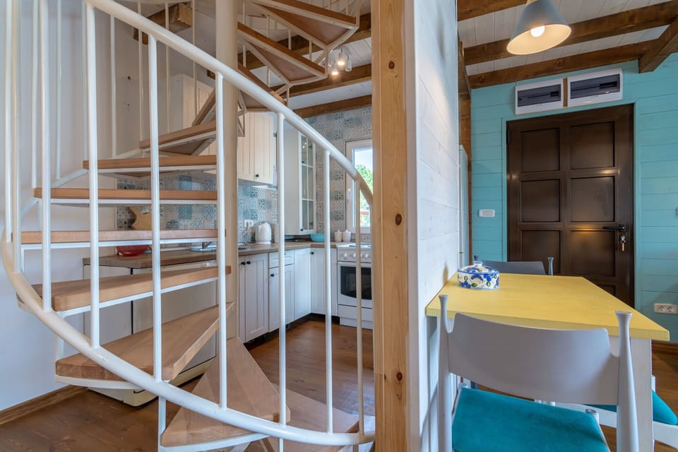 Kitchen, dining table and stairs for the first floor