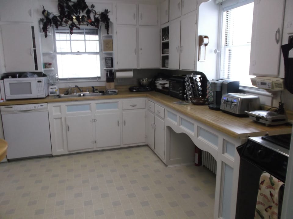 Kitchen - new appliances, micro, toaster oven, spice rack, knives, cheese board