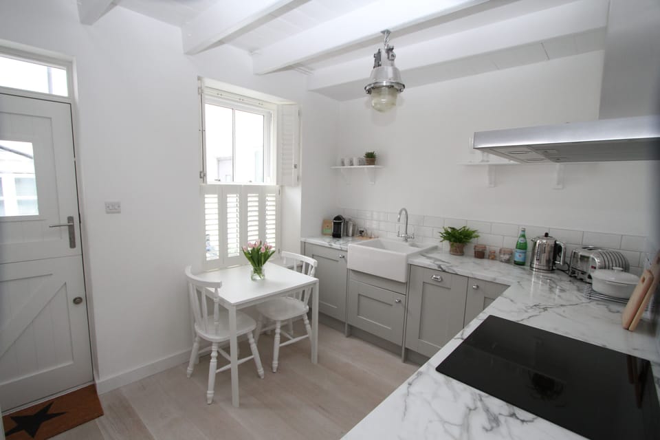 The bright kitchen with Neff and Dualit appliances & Nespresso coffee machine