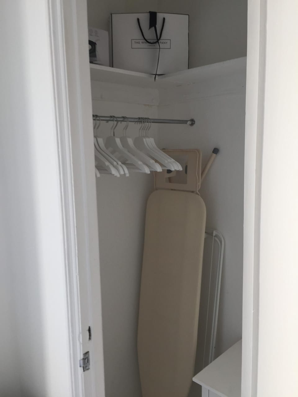The wardrobe space is spacious with plenty of hanging space and drawers