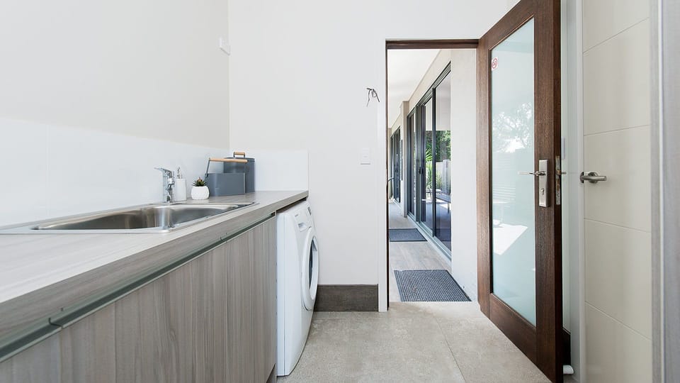 Laundry w access to Rear Deck