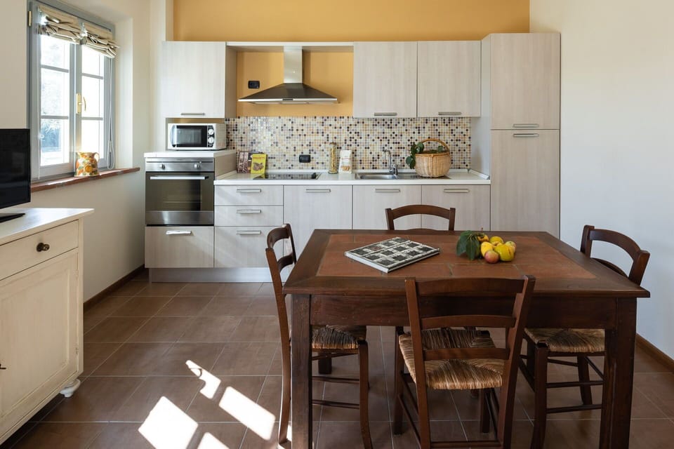 Cabinetry, Countertop, Property, Furniture, Table, Kitchen Appliance, Wood, Kitchen Stove, Interior Design, Kitchen