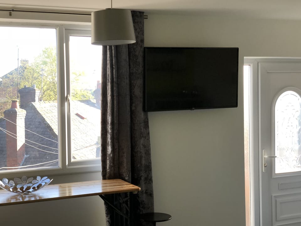 Large smart TV in the living area.