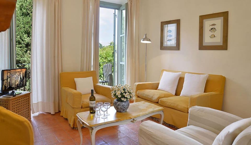 The living room has a terrace and a balcony