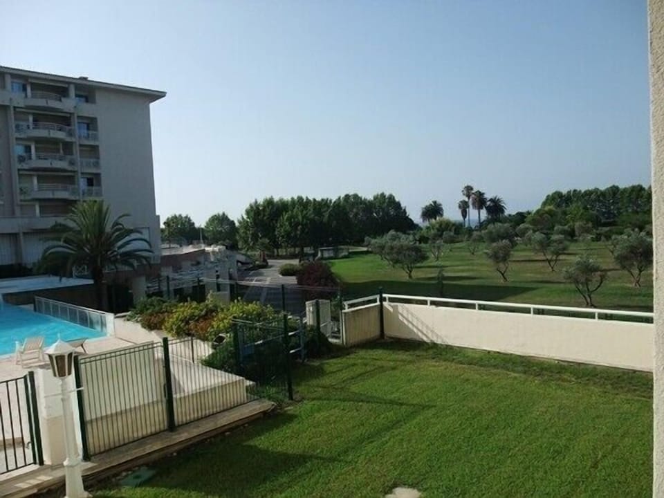 View from the Master Bedroom Balcony.
Seating area overlooking pool & sea