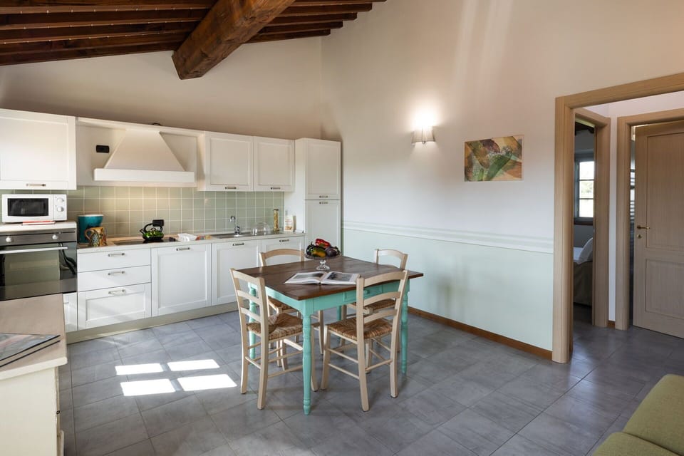 Property, Cabinetry, Countertop, Table, Door, Wood, Interior Design, Kitchen Appliance, Kitchen Stove, Home Appliance