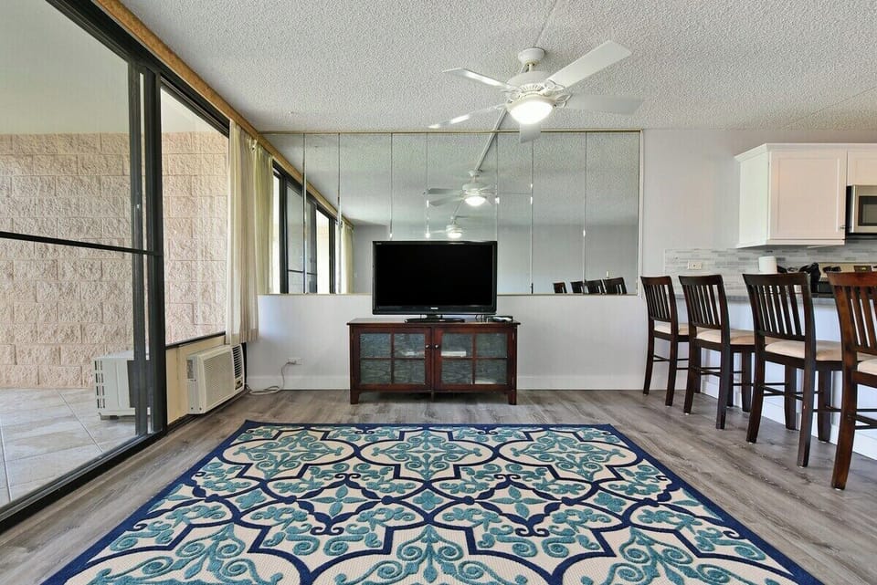 Spacious open‑concept living and dining area ideal for relaxing indoors.