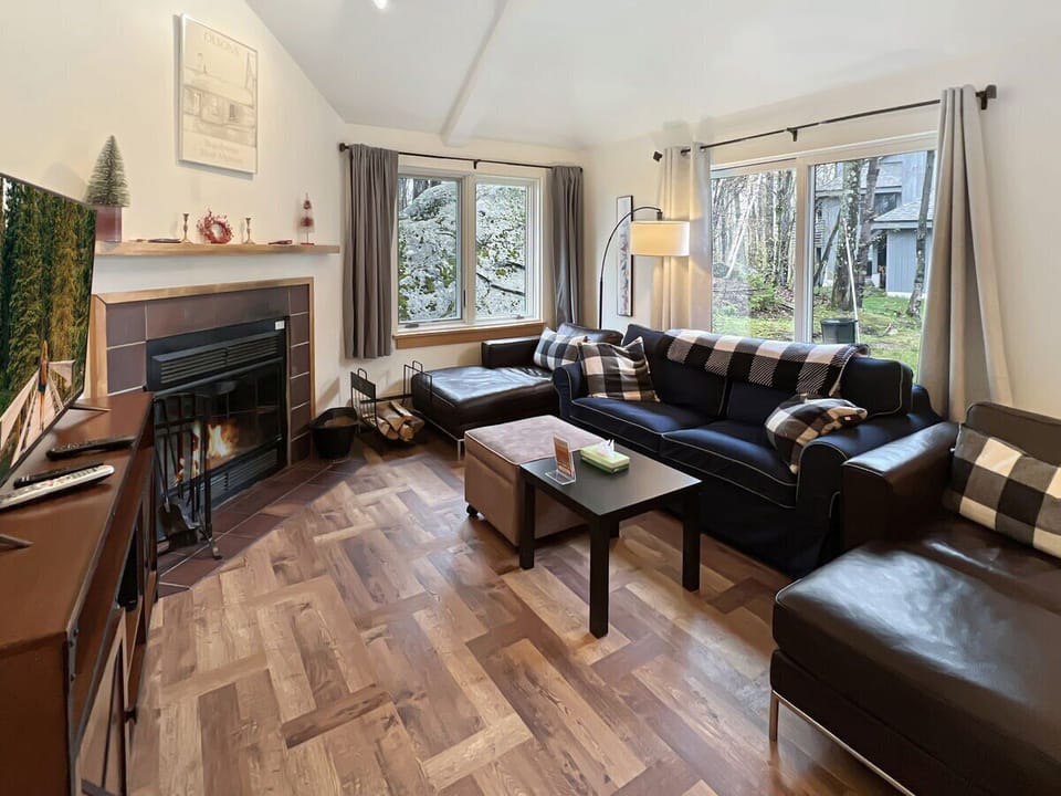 Living Room with Wood-Burning Fireplace.