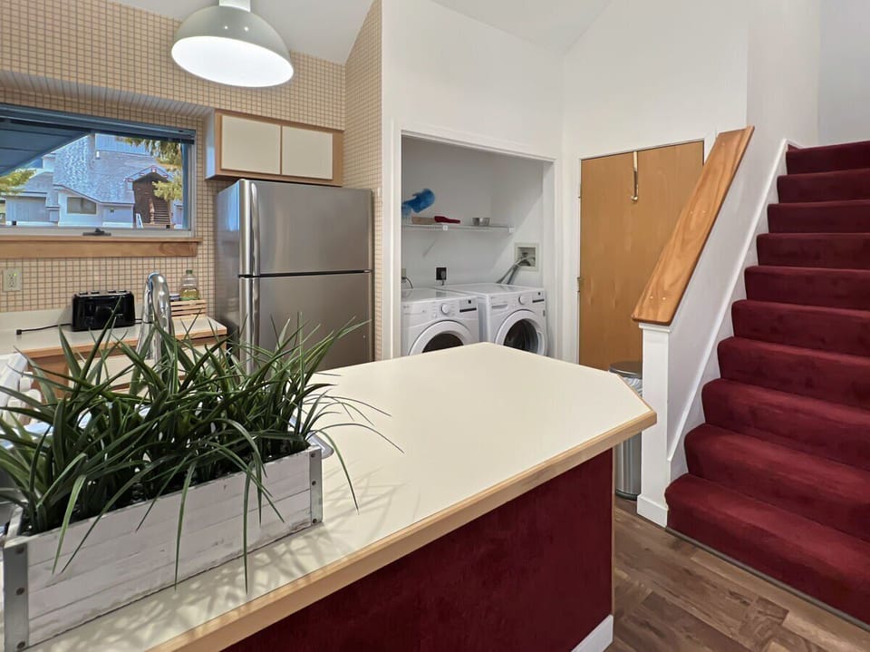 Main area with stairs to loft