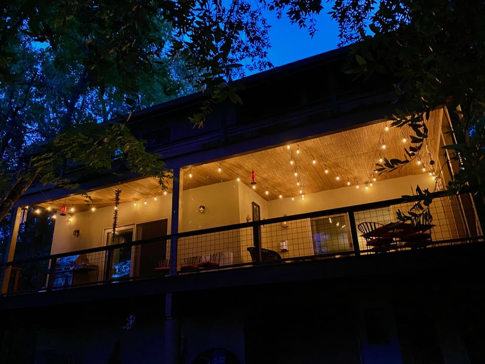 View of deck from creek level... lights are dimmable to suit your moods.  :)
