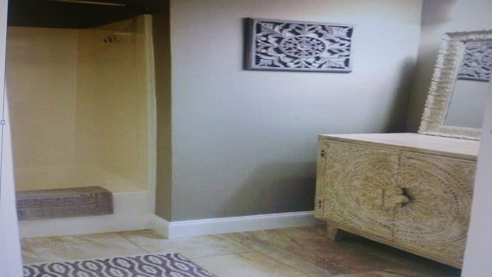 Master bath with dressing vanity.