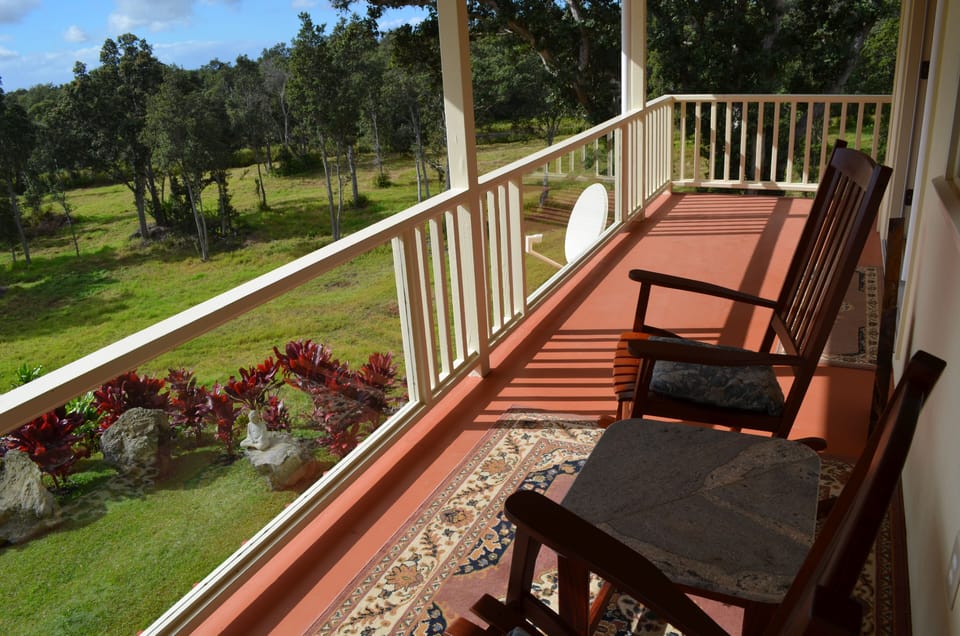 Enjoy a morning cup of Ka`u coffee on the lanai