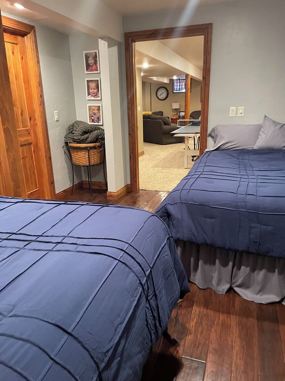Two queen beds in basement bedroom 