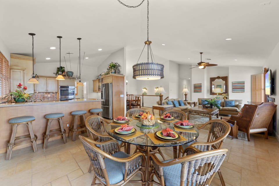 View of breakfast area, kitchen, and living area.