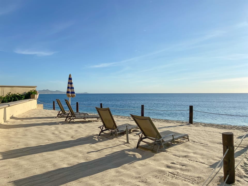 The lower level of the beach hangout spot has lounge chairs and umbrellas available in the sand.  Right on the beach in front of the beautiful Sea or Cortez ocean!