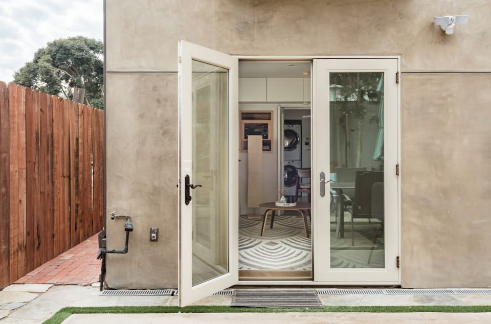 Private Patio, with seating and dining, off of the double French Door entrance