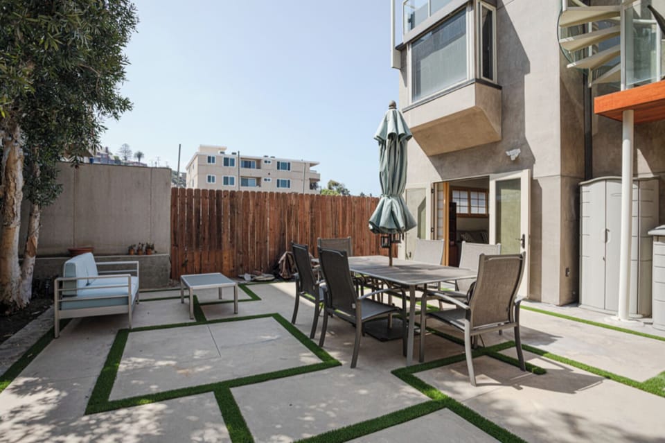 Private Patio, with seating and dining, off of the double French Door entrance