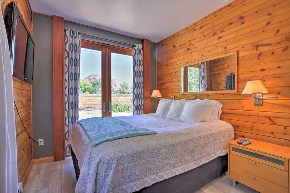 Master bedroom w/ king bed and full bathroom