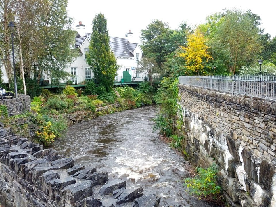 Stoneybrough from the footbridge, comprising the left one-half of the building.